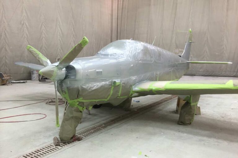 Image of a plane tapped up for new paint